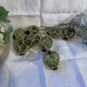 Glasflöten gröna på rep