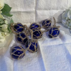 Glasflöten blå på rep